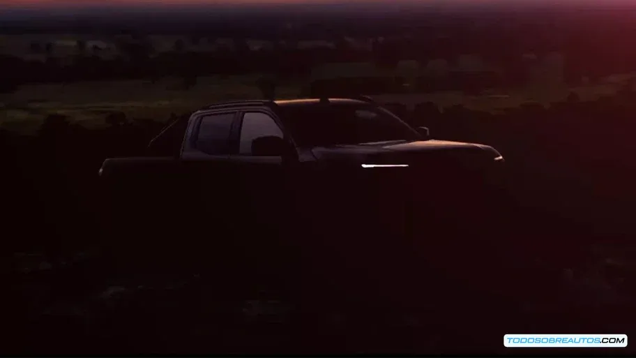 Nissan Navara 2026 render lateral híbrida enchufable