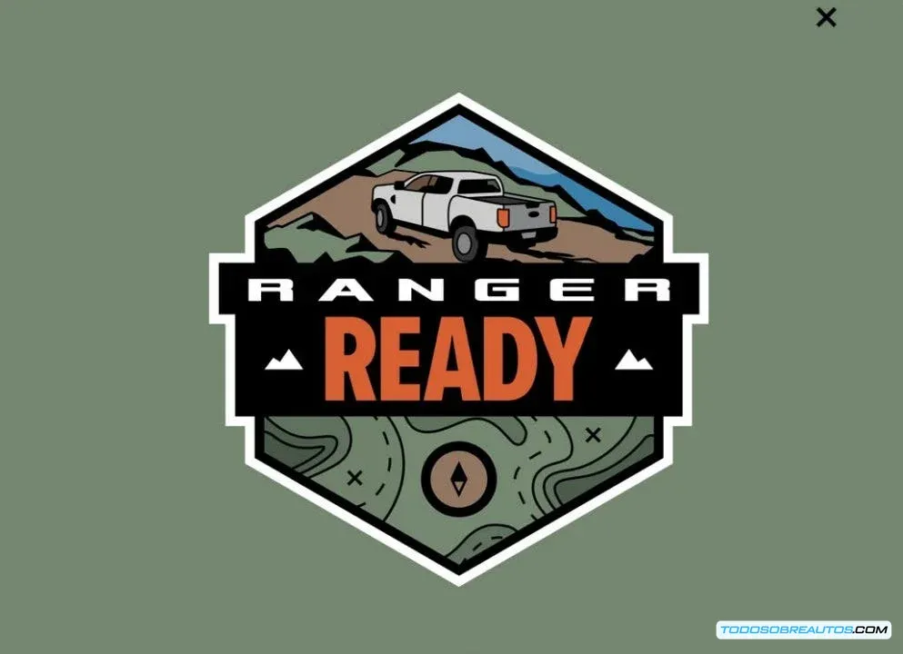 Instructor del programa Ford Ranger Ready explicando técnicas de rescate a un grupo de conductores en un entorno de formación todoterreno.