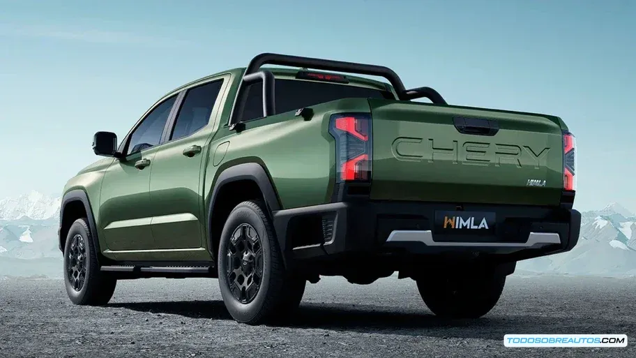 Vista lateral de la Chirey Himla 2026 mostrando su perfil de 5.3 metros de largo, caja de carga y rines de aleación de 18 pulgadas en un entorno urbano.